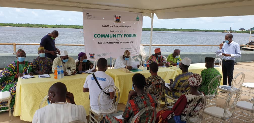 Tosin Eso, Social Development Consultant FCN, addressing community members 